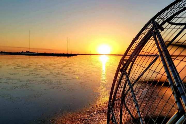 a sunset over a body of water